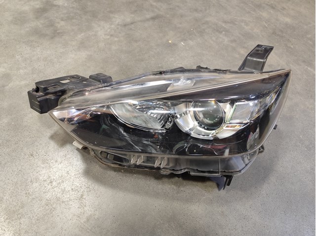 Блок фара ліва D10E51040 MAZDA
