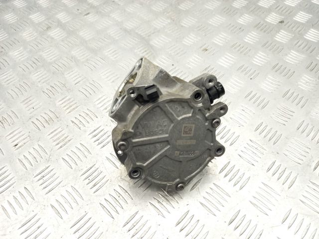 Насос вакуумний 06K145100AE VAG