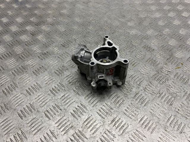 Насос вакуумний 06K145100BB VAG
