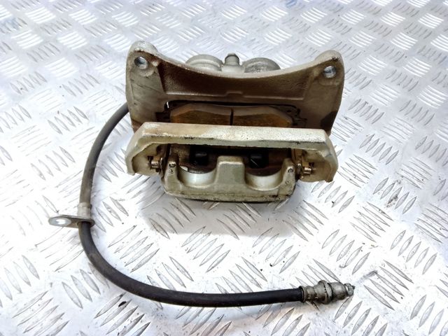 Супорт гальмівний, передній, правий 26292AN00D SUBARU