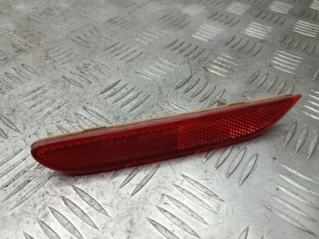 Лівий відбивач бампера 26565JJ90A NISSAN