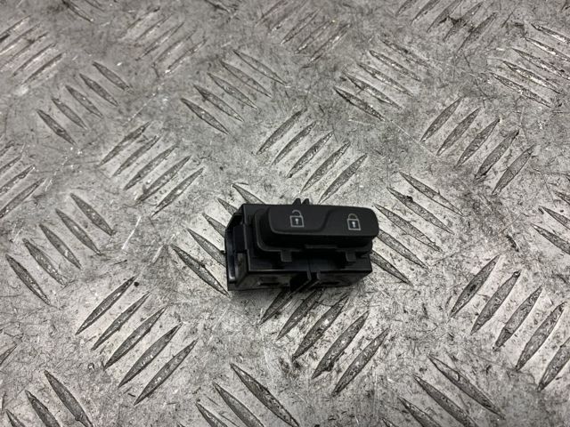Кнопка блокування замка дверей 31343099 VOLVO