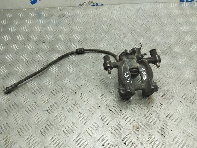Супорт гальмівний задній правий 34206883034 BMW