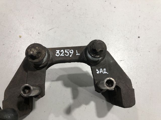 Скоба гальмівного заднього супорта 34216776801 BMW