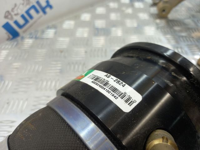 Амортизатор задній, лівий 37106858811 BMW