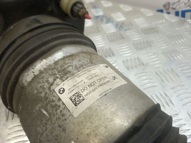 Амортизатор задній, лівий 37107915953 BMW