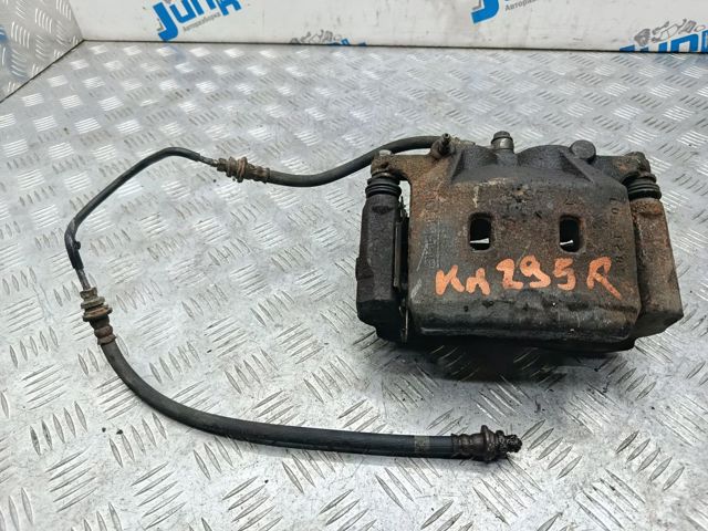Супорт гальмівний, передній, правий 410014GS0A NISSAN