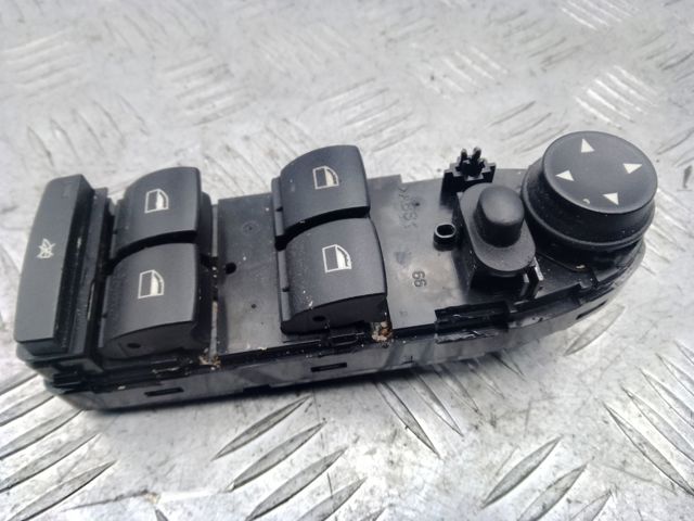 Кнопки переднього лівого склопід'ємника 61319217326 BMW
