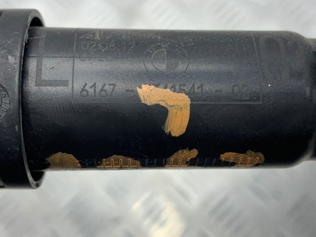 Форсунка омивача фари передньої, лівої 61677341541 BMW