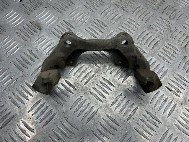 Скоба гальмівного заднього супорта 68052374AA CHRYSLER
