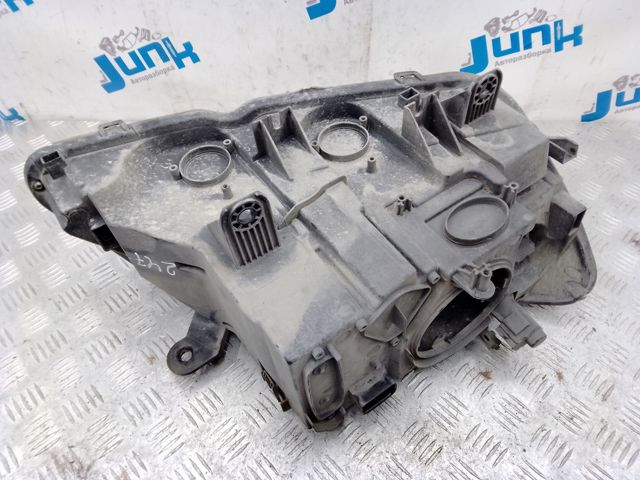 Фара ліва передня 7222025 BMW
