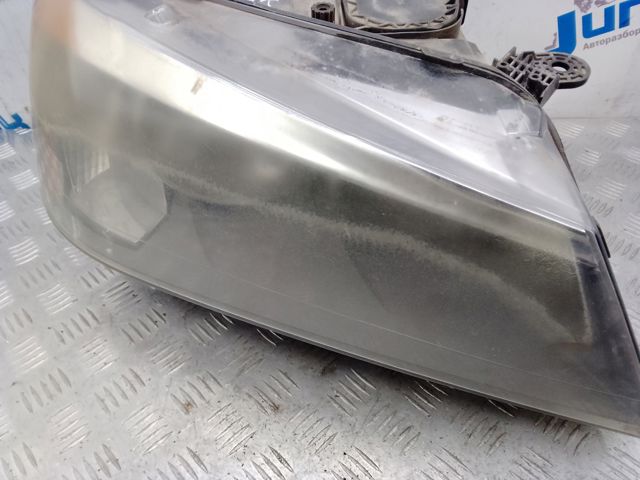 Фара передня права 7222026 BMW