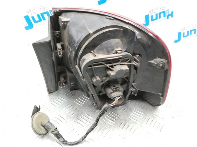 Задня ліва зовнішня фара 7L6945095S VAG