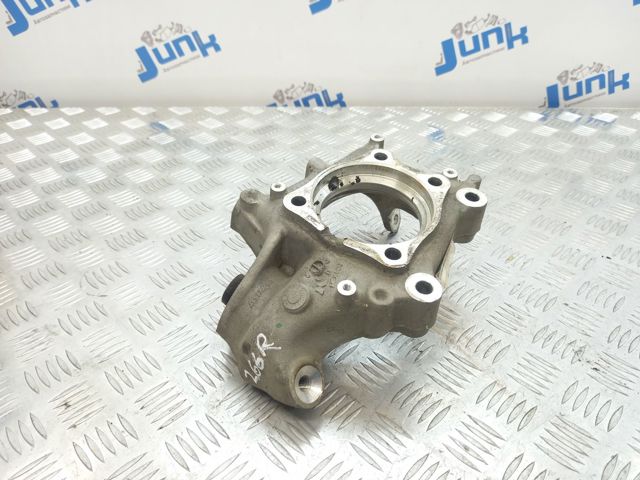 Кулак поворотний правий 80A505432G VAG