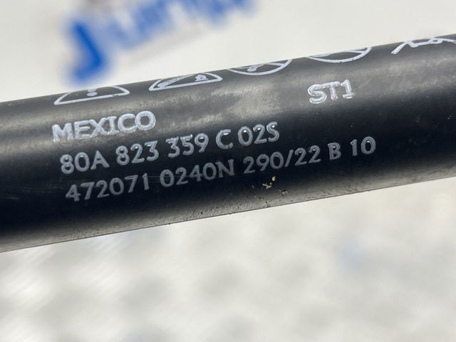 Стійка капота 80A823359C VAG