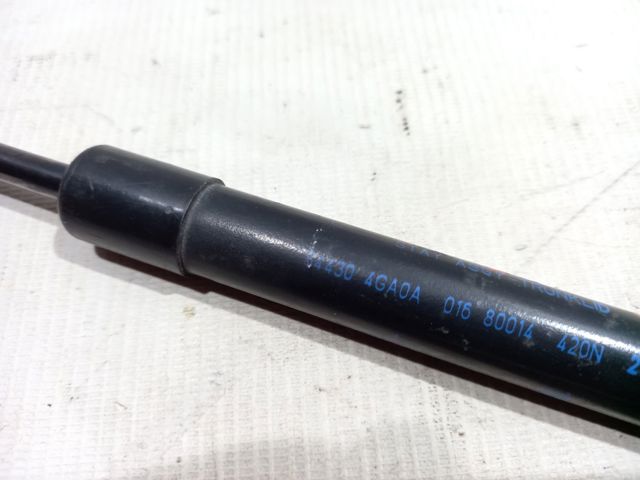 Амортизатор двері п'ятої 844304GA0A NISSAN