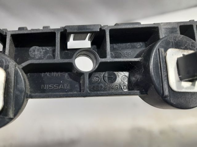 Кронштейн бампера заднього, лівий 852244GA0A NISSAN