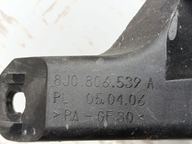 Кронштейн бампера переднього, лівий 8J0806539A VAG