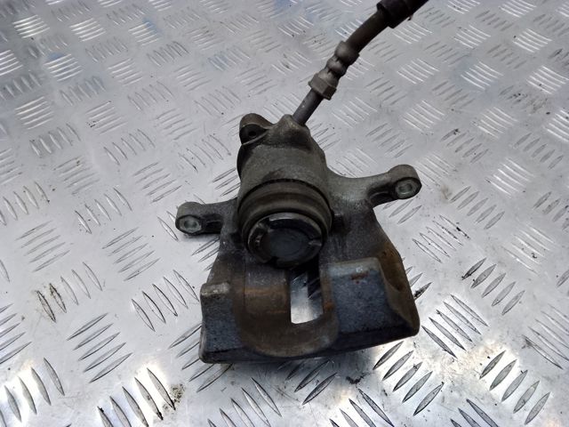 Супорт гальмівний задній правий 8K0615404E VAG