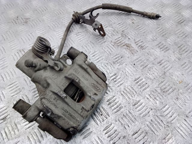 Супорт гальмівний задній правий 8M5Z2552B FORD