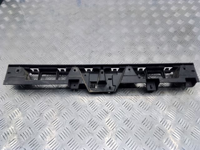 Лівий кронштейн кріплення бампера заднього 97050564101 VAG
