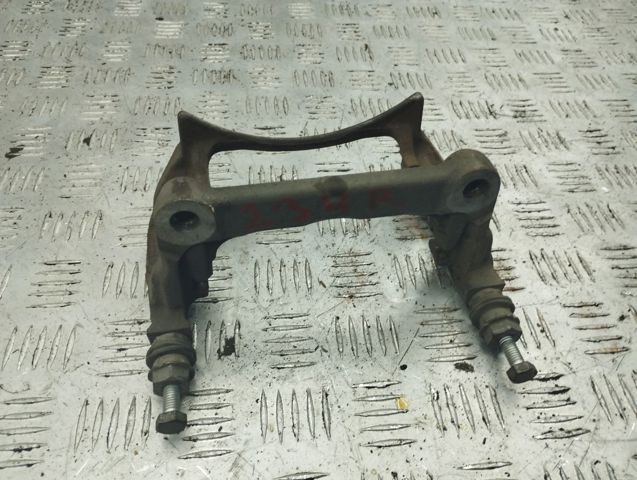 Скоба гальмівного супорта переднього A0004215606 MERCEDES