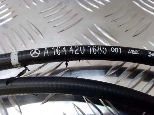 Трос стоянкового гальма передній A1644201685 MERCEDES