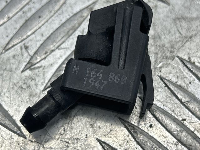 Форсунка омивача скла лобового, ліва A1648601947 MERCEDES
