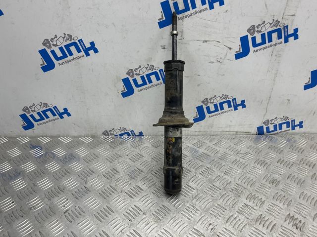 Амортизатор передньої підвіски E61104GC0D NISSAN