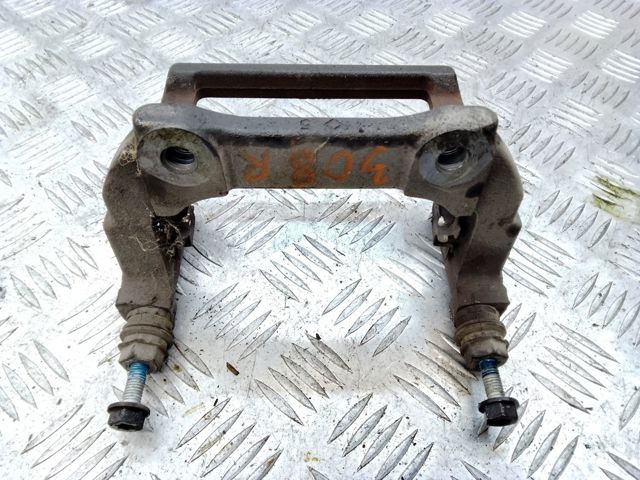 Скоба гальмівного заднього супорта LR036569 LAND ROVER