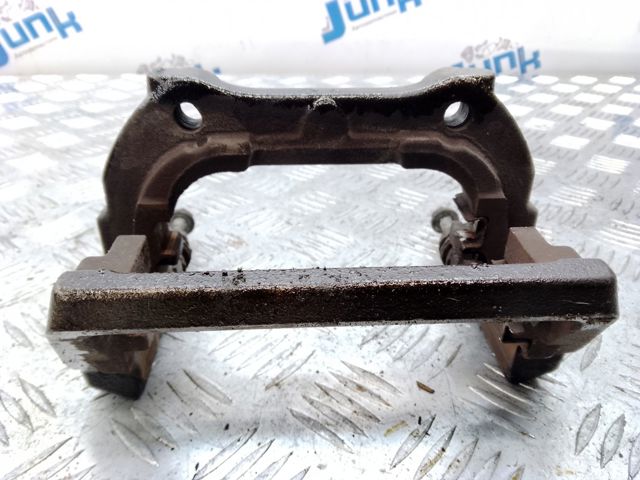 Скоба гальмівного заднього супорта LR036571 LAND ROVER