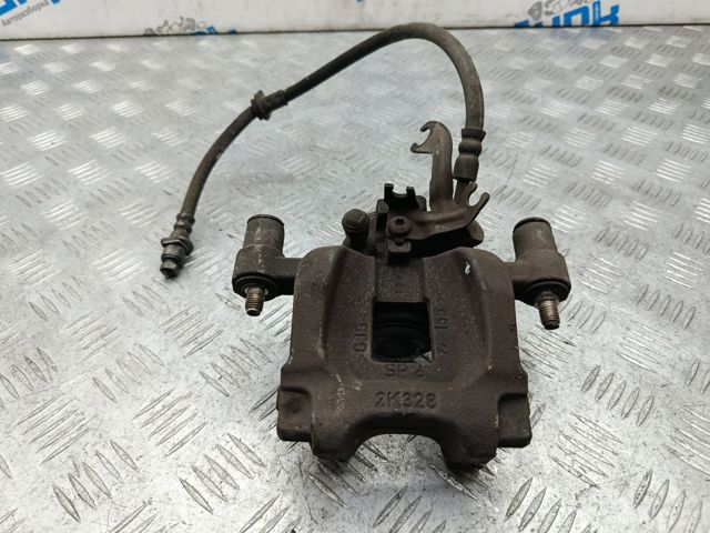 Задній гальмівний супорт лівий LR061381 LAND ROVER