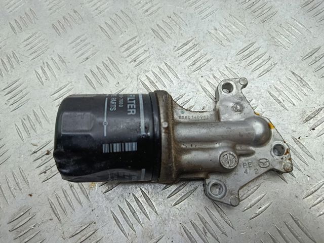 Корпус масляного фільтра PE0114311 MAZDA