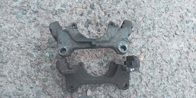 Кронштейн гальмівного супорта 3C0615125 VAG