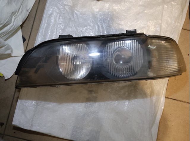 Фара ліва 63128386563 BMW