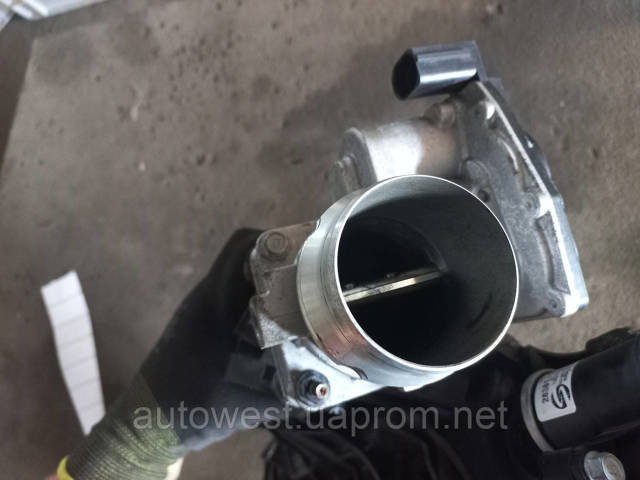 Дросільна заслінка в зборі 351002F900 HYUNDAI