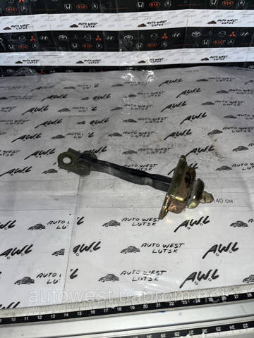 Обмежувач відкриття дверей, передній 80430AV600 NISSAN