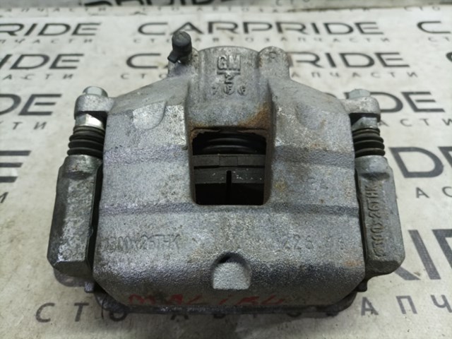 Супорт гальмівний, передній, правий 13507536 GM