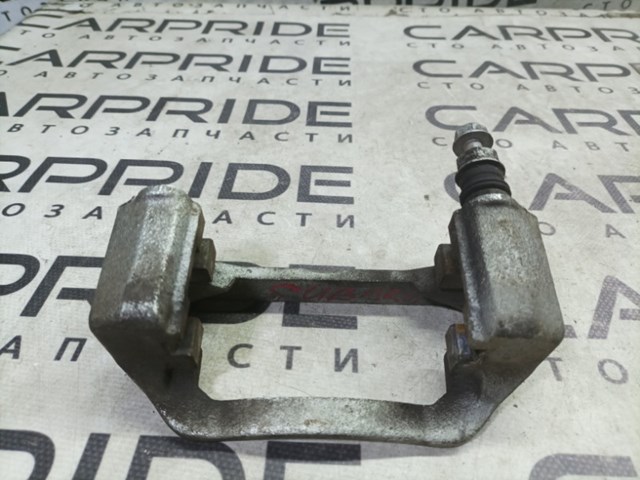 Скоба гальмівного заднього супорта 26625FG000 SUBARU