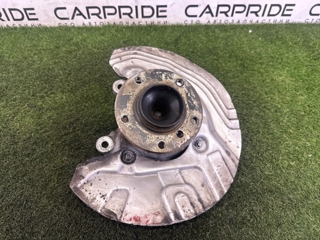 Цапфа поворотна права 31216784866 BMW