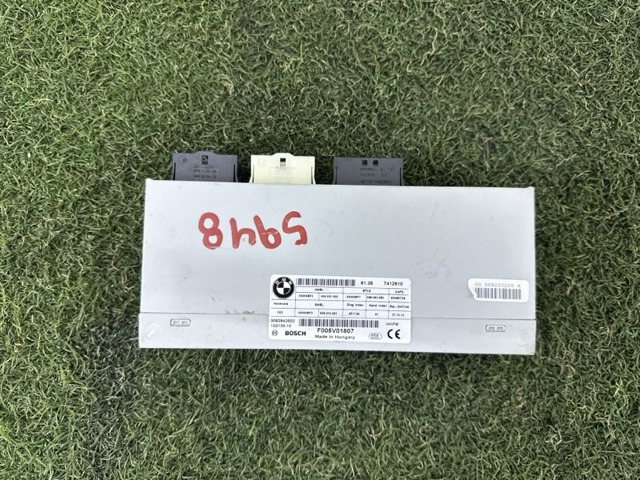 Блок управління відкриття кришки багажника 61357412610 BMW