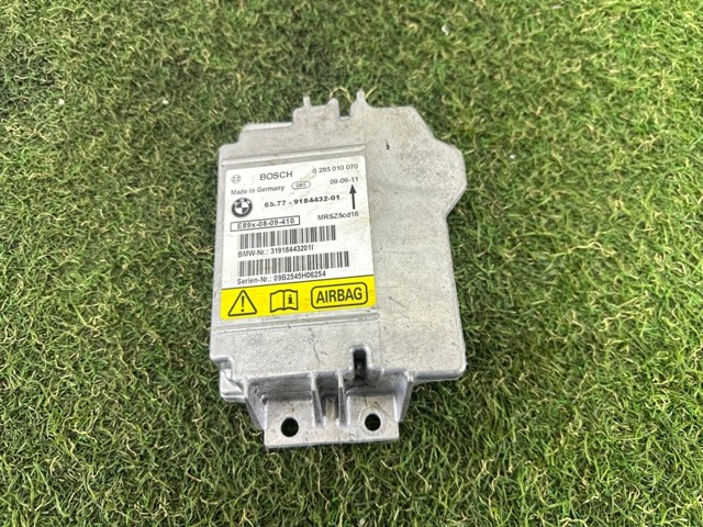 Блок управління airbag 65779184432 BMW