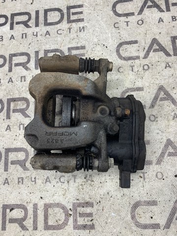 Задній гальмівний супорт лівий 68263130AA CHRYSLER
