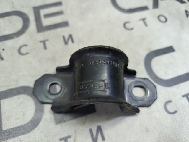 Хомут кріплення втулки стабілізатора, заднього DG9C5B484AXB FORD