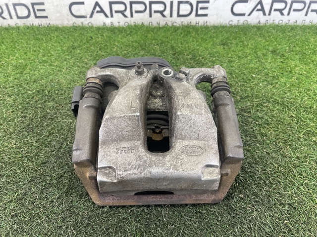 Скоба гальмівного заднього супорта LR036571 LAND ROVER