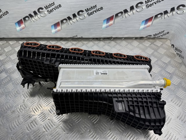 Колектор впускний 11617952861 BMW