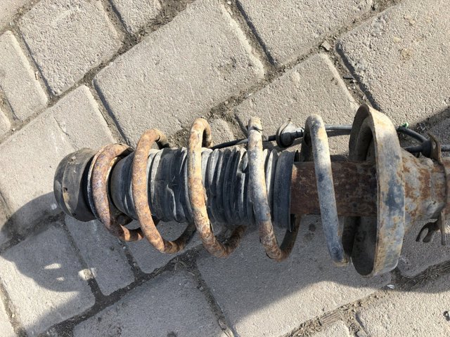 Стійка передня 1J0413031AM VAG