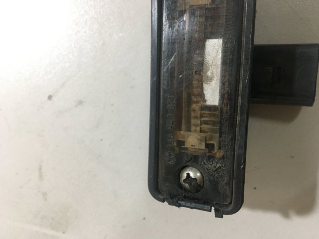 Ліхтар підсвічування заднього номерного знака 1J6943021 VAG