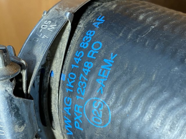 Патрубок дросельний 1K0145838AF VAG