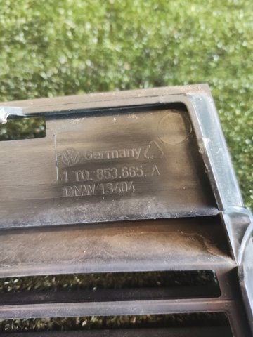 Решітка переднього бампера, ліва 1T0853665A VAG